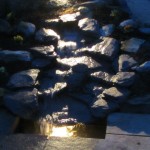 Lit waterfall and sump